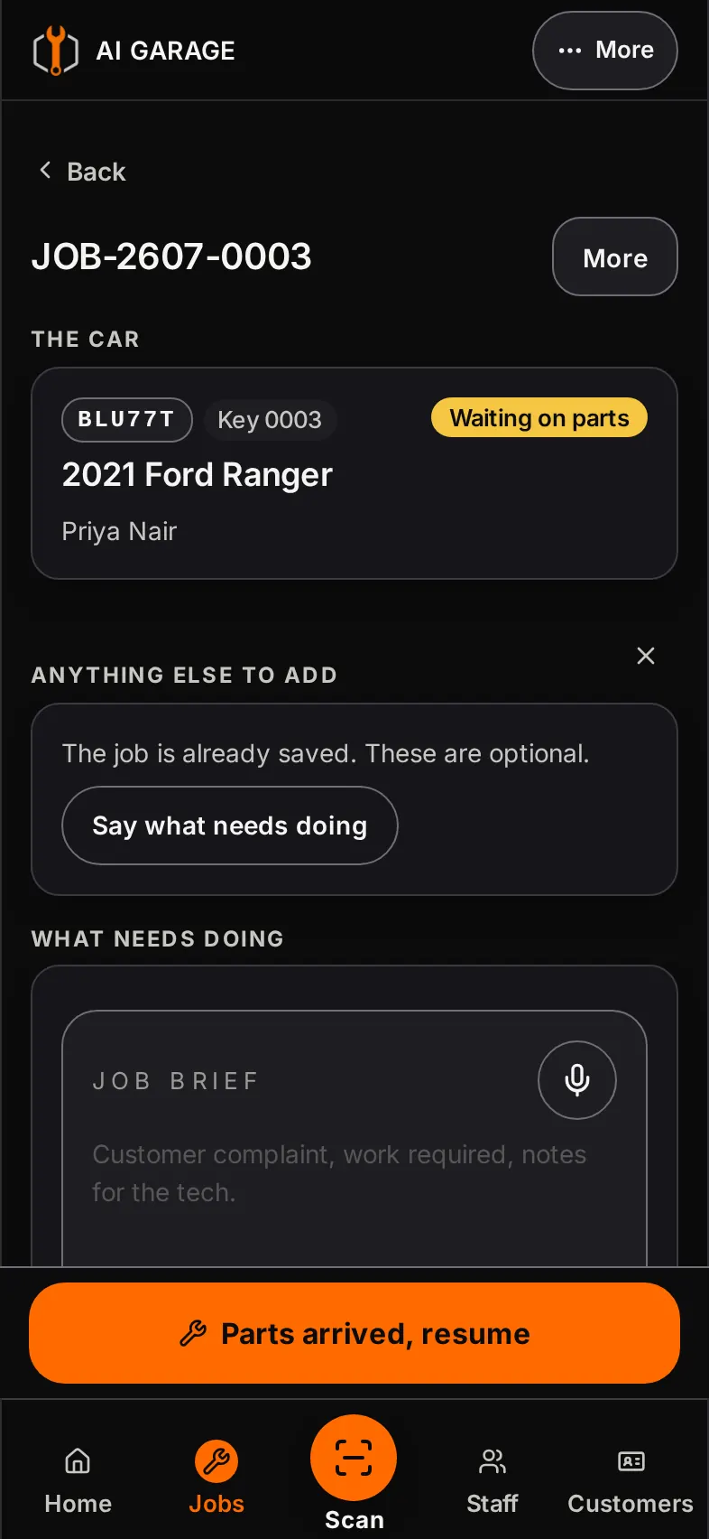 AI Garage job screen showing the car, the job brief and a parts arrived button